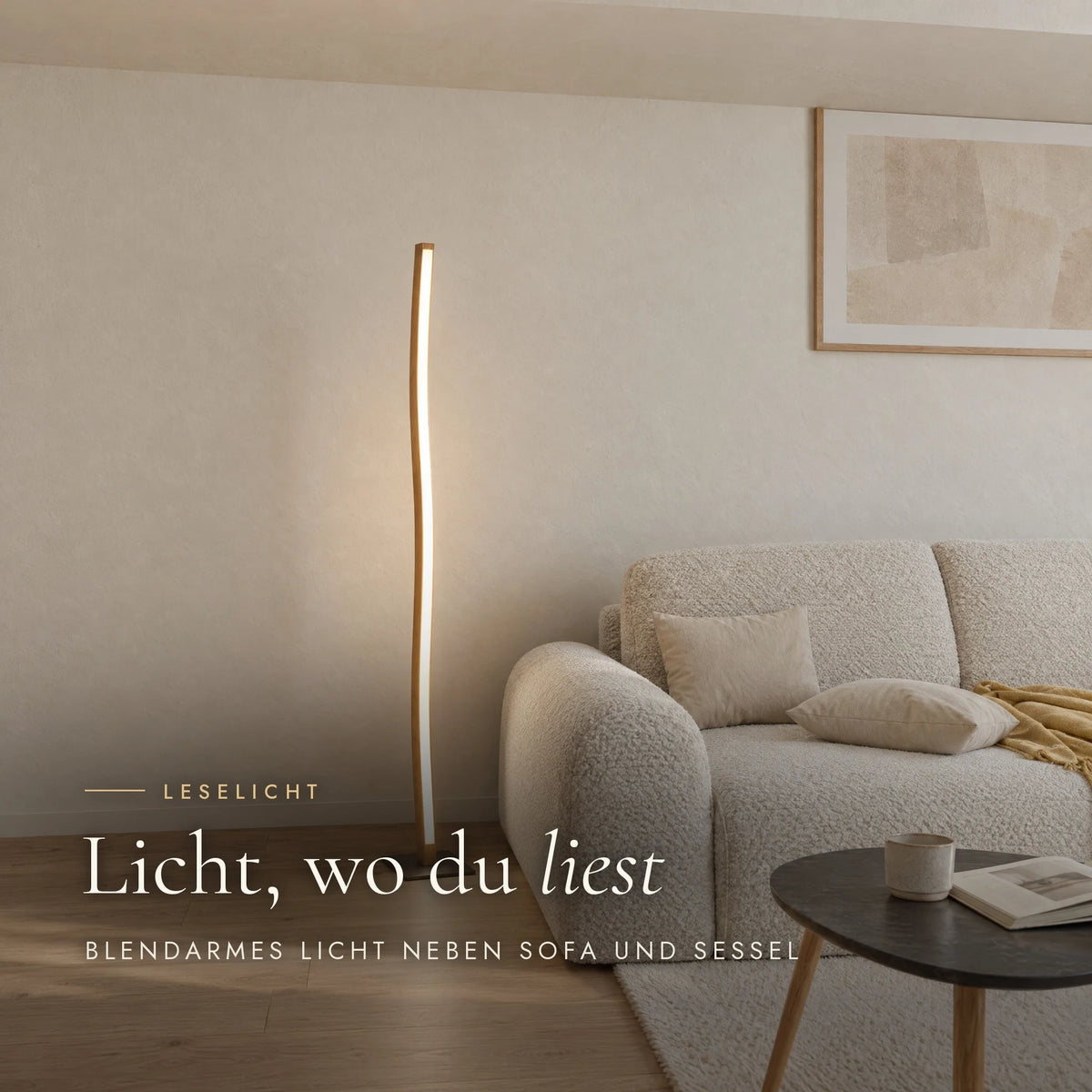 Nivara floor lamp as a low-glare reading light next to sofa and armchair