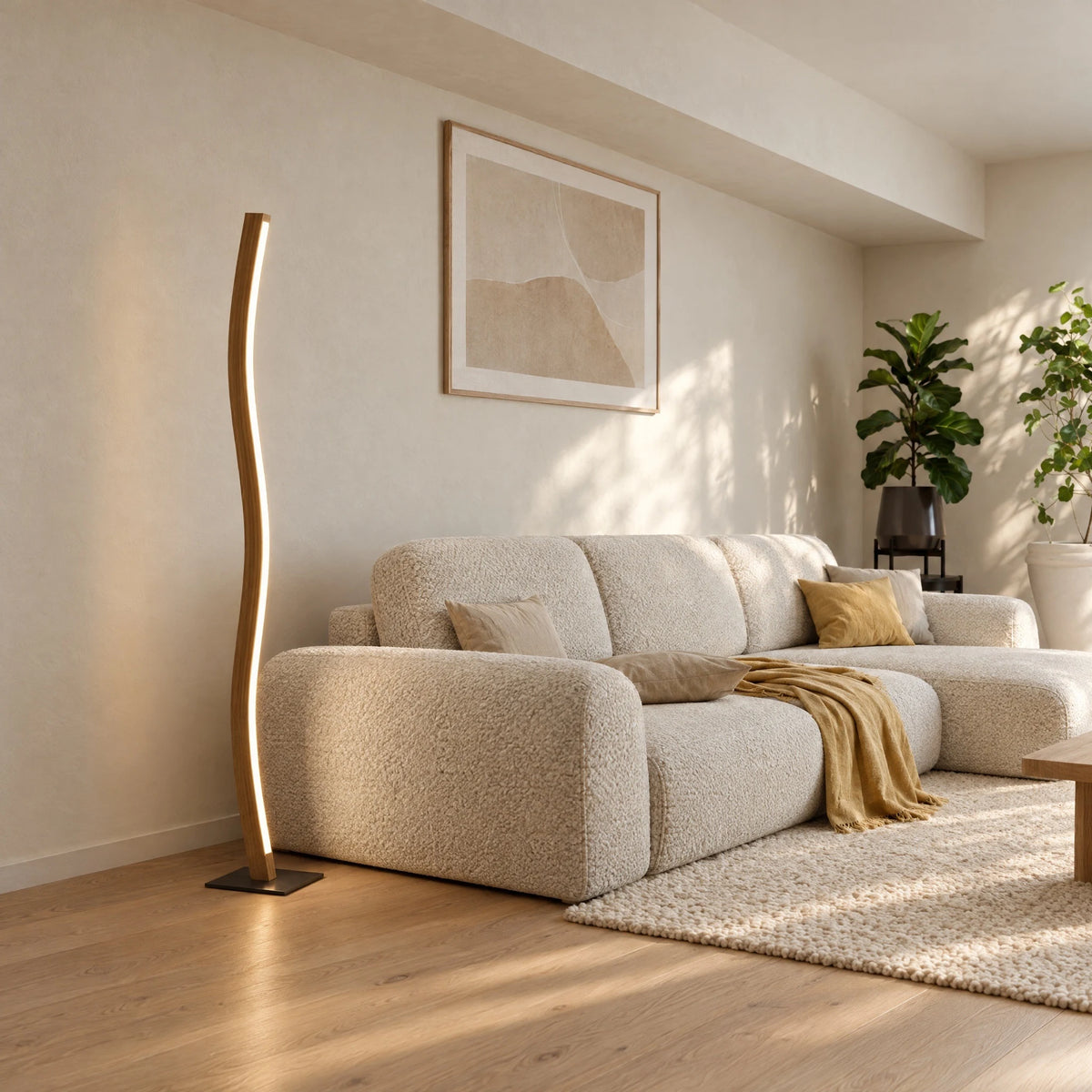 Nivara floor lamp in oak with a wave shape beside the sofa in the living room