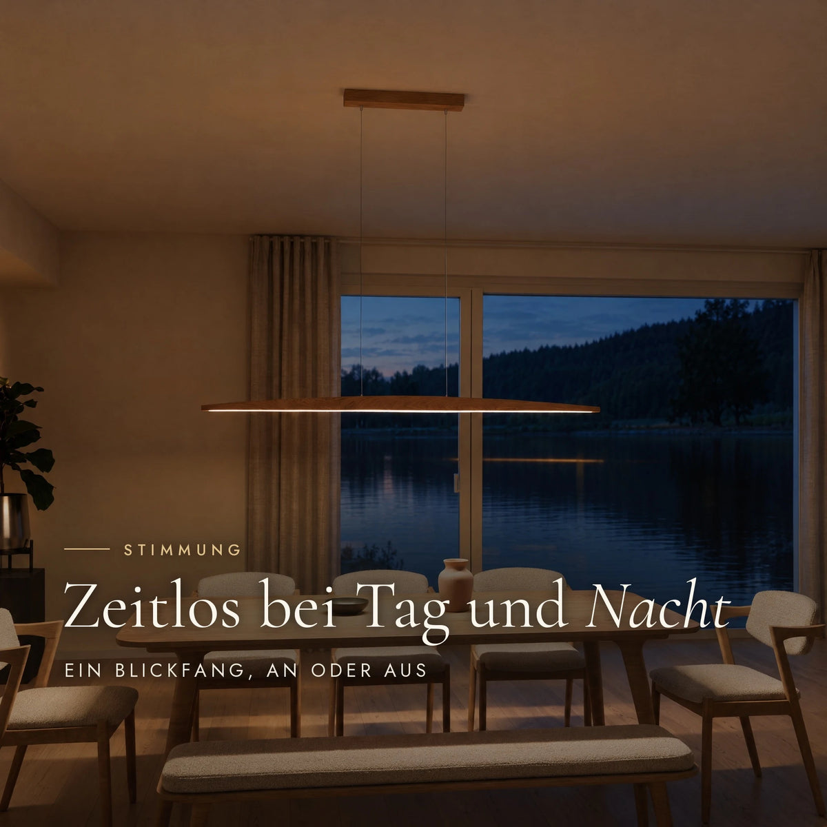 Elia pendant light in the evening: warm light above the dining table, the lake outside at dusk