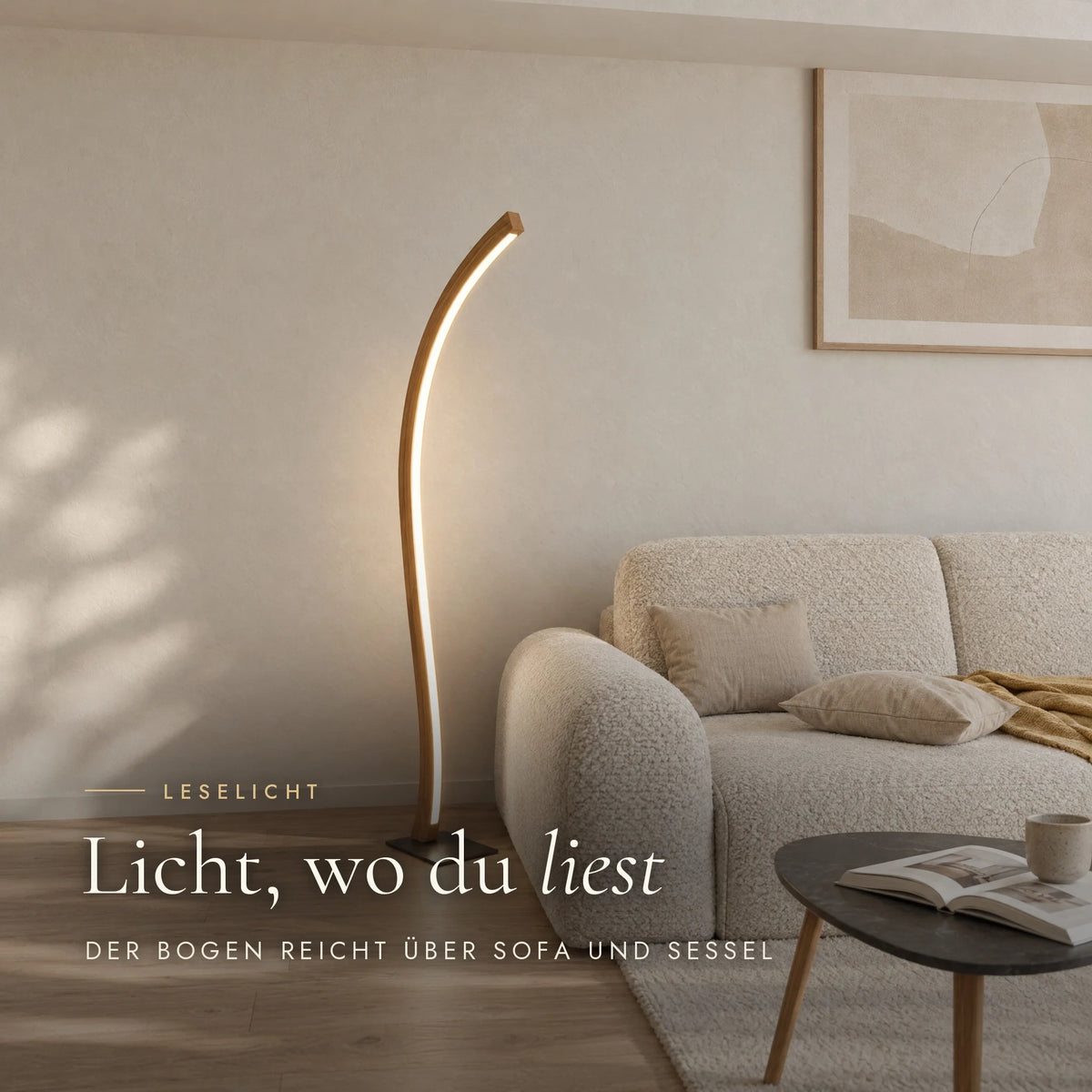 Fulgor floor lamp as a reading light next to the sofa, with a side table and a book