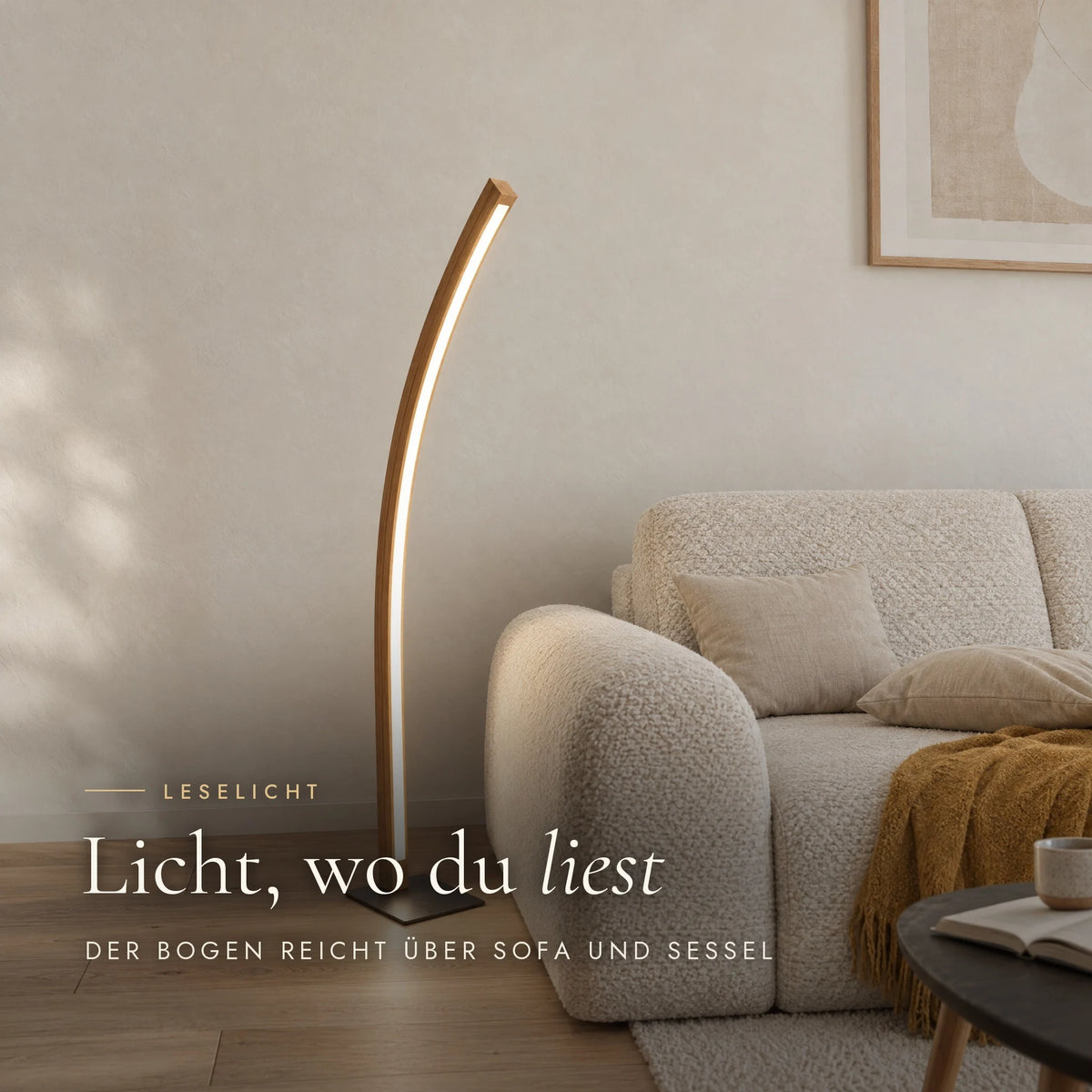 Solara floor lamp as a reading light next to the sofa, with a side table and a book