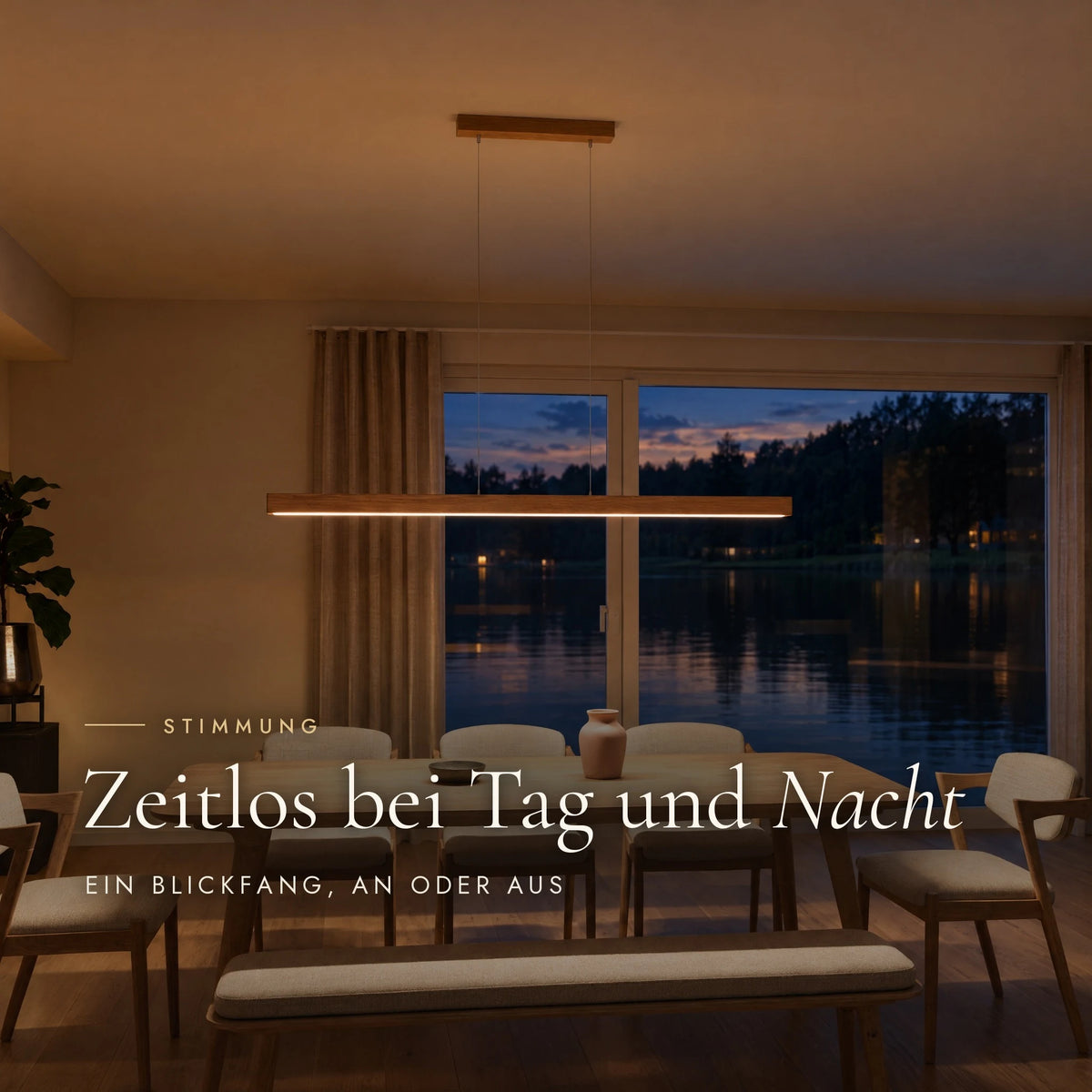 Pendelleuchte Tara am Abend eingeschaltet über dem Esstisch, warmes Licht